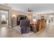 Inviting living room featuring a stylish entertainment center and comfortable seating at 10650 E Palladium Dr, Mesa, AZ 85212