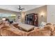 A bright living room with modern furnishings, neutral color palette, and access to the outdoor area at 10650 E Palladium Dr, Mesa, AZ 85212