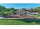 A unique playground with climbing features for neighborhood to enjoy at 10650 E Palladium Dr, Mesa, AZ 85212