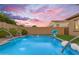 Beautiful pool area features relaxing water fountains and a basketball hoop for added entertainment at 10650 E Palladium Dr, Mesa, AZ 85212