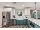 Well-designed kitchen with stainless steel appliances, a farmhouse sink, and stylish cabinetry at 1522 W Willetta St, Phoenix, AZ 85007