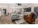 Open-concept living and dining area showcases modern finishes, stylish lighting, and an inviting atmosphere at 1522 W Willetta St, Phoenix, AZ 85007