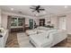 Bright and airy living room with stylish furniture, hardwood floors, and ample natural light at 1522 W Willetta St, Phoenix, AZ 85007