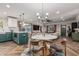 Beautiful open living space with a well-equipped kitchen, comfortable dining area, and stylish decor at 1522 W Willetta St, Phoenix, AZ 85007