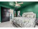 A primary bedroom boasts an ensuite bath with a barn door for added privacy at 1522 W Willetta St, Phoenix, AZ 85007