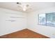 Well lit bedroom with wood floors and a bright window at 16644 N 33Rd St # 101, Phoenix, AZ 85032