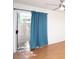 Bedroom with a sliding glass door and curtain at 16644 N 33Rd St # 101, Phoenix, AZ 85032