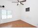 Bedroom featuring a vaulted ceiling, fan, and bright window at 16644 N 33Rd St # 101, Phoenix, AZ 85032