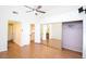 Bedroom featuring a ceiling fan, sliding door closet and ensuite bath at 16644 N 33Rd St # 101, Phoenix, AZ 85032
