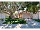 Charming home exterior with mature trees and well-maintained landscaping at 16644 N 33Rd St # 101, Phoenix, AZ 85032