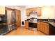 Kitchen with stainless steel appliances and wood cabinets at 16644 N 33Rd St # 101, Phoenix, AZ 85032