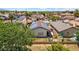 Aerial view of the home featuring solar panels at 17115 N Larkspur Ln, Surprise, AZ 85374