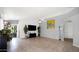 Bright living room with tile flooring, fan and gray walls at 17115 N Larkspur Ln, Surprise, AZ 85374