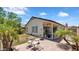The patio features brick pavers, and sitting area at 17115 N Larkspur Ln, Surprise, AZ 85374