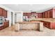 Spacious kitchen featuring an island, stainless steel appliances, and ample cabinet space at 1755 E Tonto Dr, Chandler, AZ 85249