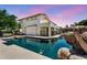 Beautiful backyard pool with rock features, perfect for relaxation and outdoor enjoyment at 1755 E Tonto Dr, Chandler, AZ 85249
