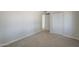 Neutral painted bedroom with plush carpet, and a closet for optimal storage at 17848 N 34Th Ln, Phoenix, AZ 85053