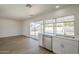 Kitchen with stainless steel appliances and white cabinets, overlooking the backyard pool area at 17848 N 34Th Ln, Phoenix, AZ 85053