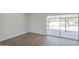 Open concept living space with sliding glass doors to the patio and pool area at 17848 N 34Th Ln, Phoenix, AZ 85053
