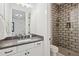 Stylish bathroom featuring modern fixtures, a glass-enclosed shower, and a sleek vanity at 19910 E Vallejo St, Queen Creek, AZ 85142