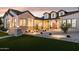 Beautiful home featuring manicured front yard, stone accents, and inviting walkway to the front door at 19910 E Vallejo St, Queen Creek, AZ 85142
