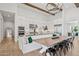 Spacious kitchen with white cabinets, stainless steel appliances, and an island with a dining area at 19910 E Vallejo St, Queen Creek, AZ 85142