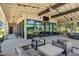 Inviting outdoor patio space perfect for relaxing or entertaining with comfortable seating and modern decor at 19910 E Vallejo St, Queen Creek, AZ 85142