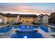 Backyard featuring a luxurious pool with a spa and beautiful patio great for entertaining at 19910 E Vallejo St, Queen Creek, AZ 85142