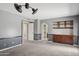 Empty bedroom with neutral carpet, two-tone gray walls and archway to the ensuite at 2053 W Natal Cir, Mesa, AZ 85202