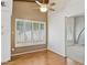 Bright dining area with hardwood floors, plantation shutters, and seamless flow to living spaces at 2053 W Natal Cir, Mesa, AZ 85202