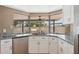 Kitchen sink overlooking a bay window to a patio area at 2053 W Natal Cir, Mesa, AZ 85202