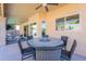 Covered back patio with a ceiling fan, outdoor furniture, and an extended view of the yard at 20809 N 17Th St, Phoenix, AZ 85024