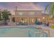 Spacious backyard with a swimming pool, covered patio, and outdoor seating area at 20809 N 17Th St, Phoenix, AZ 85024