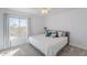 Neutral bedroom features carpet, large window with curtains, and a comfortable bed at 20809 N 17Th St, Phoenix, AZ 85024