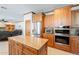 Gourmet kitchen boasts stainless steel appliances, granite counters, and a spacious island at 20809 N 17Th St, Phoenix, AZ 85024