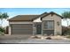 Charming single-story home features a two-car garage, neutral paint, and low-maintenance landscaping at 2179 E Mill Rd, San Tan Valley, AZ 85140