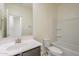 Standard bathroom with a shower-tub combination, a single sink vanity, and neutral finishes at 297 W Nikita Dr, San Tan Valley, AZ 85140