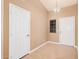 Bright foyer featuring neutral paint, tile floors, high ceilings, and a pendant light at 3343 W Lone Cacuts Dr, Phoenix, AZ 85027