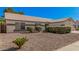Inviting single-story home with desert landscaping, manicured bushes, and neutral exterior paint at 3343 W Lone Cacuts Dr, Phoenix, AZ 85027