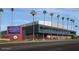 Exterior of Grand Canyon University building featuring modern architecture and palm tree landscaping at 3347 W Roma Ave, Phoenix, AZ 85017