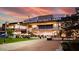 Exterior view of Grand Canyon University Arena showing the entrance and surrounding landscaping at 3347 W Roma Ave, Phoenix, AZ 85017