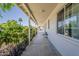 Inviting covered porch with view of greenery and natural light at 3347 W Roma Ave, Phoenix, AZ 85017