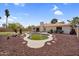 Backyard showcasing pool, covered patio, and desert landscaping features at 3514 W Helena Dr, Glendale, AZ 85308