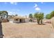 Spacious backyard with a covered patio and a swimming pool in ground at 3514 W Helena Dr, Glendale, AZ 85308
