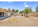 Spacious backyard with a covered patio and a swimming pool in ground at 3514 W Helena Dr, Glendale, AZ 85308