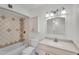 Bathroom featuring a bath tub, toilet, and sink at 3514 W Helena Dr, Glendale, AZ 85308