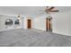Open-concept living area with tile entry and three ceiling fans at 3514 W Helena Dr, Glendale, AZ 85308