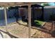 Backyard with seating under a pergola with a partially turfed yard at 3830 W Cavalier Dr, Phoenix, AZ 85019