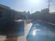 Backyard featuring a refreshing swimming pool and outdoor gathering spaces at 3830 W Cavalier Dr, Phoenix, AZ 85019