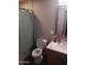 Well-lit bathroom featuring a vanity and a shower with a curtain at 3830 W Cavalier Dr, Phoenix, AZ 85019